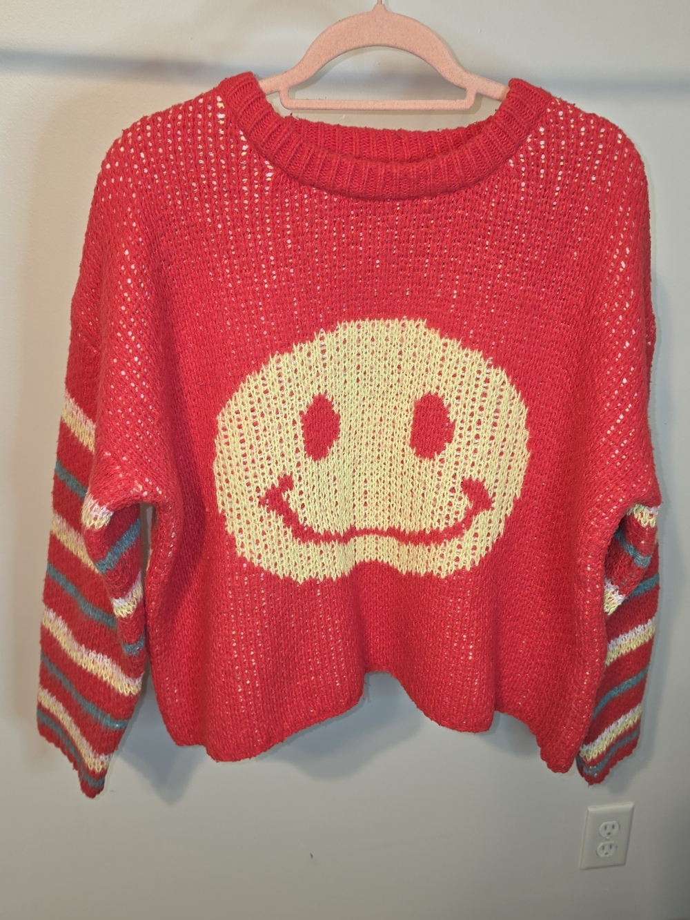 easel Red Knit Smiley Face Sweater with Striped Sleeves